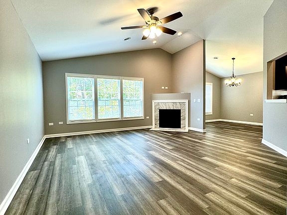 Living room with vaulted ceiling