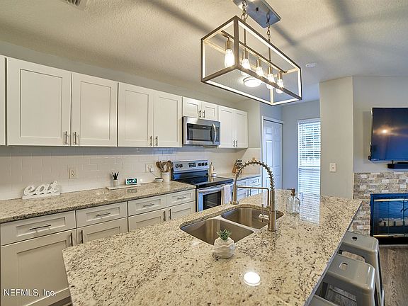 4th image of 1534 Sand Dollar Cir Unit No 13 D Lo