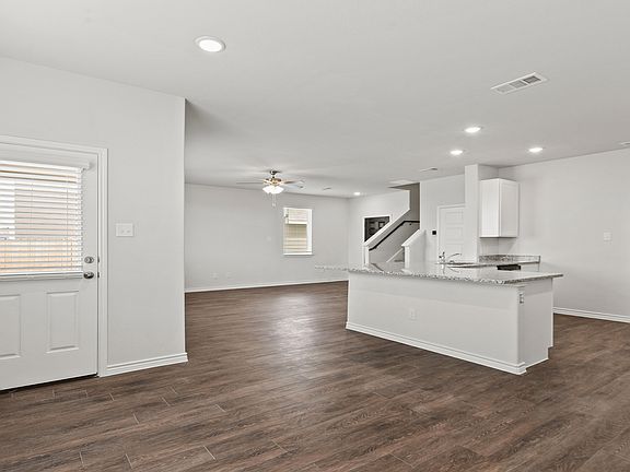 Dining to kitchen and family room