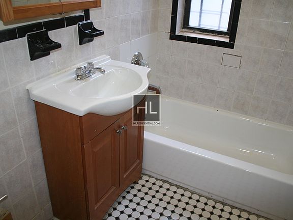 5th image of 14715 Northern Blvd APT 6L