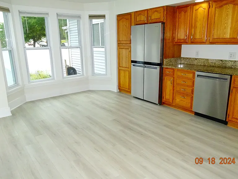 Sunny bump out which makes this a large eat- in kitchen.