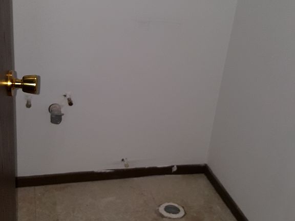 1/2 bath rough plumbed.