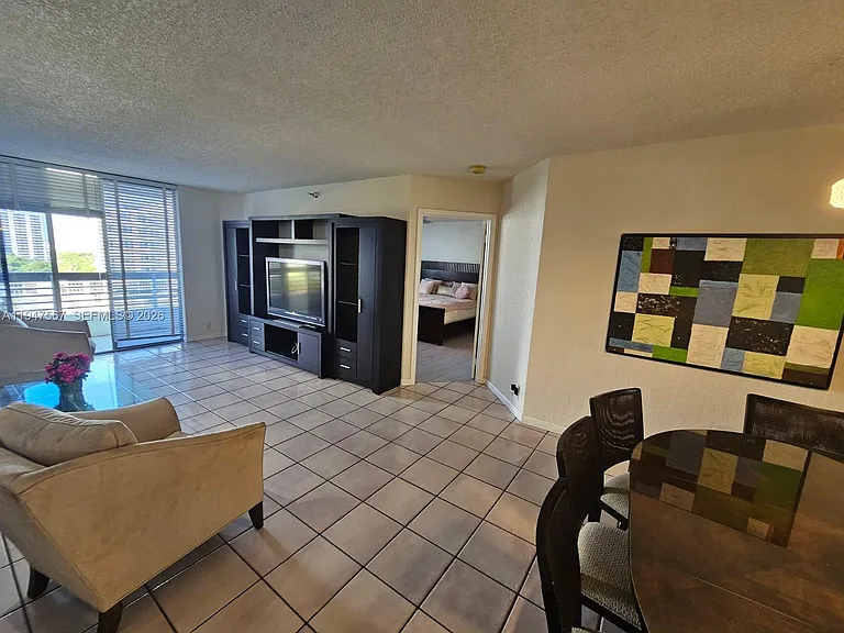 3530 Mystic Pointe Dr #1202 — Photo 4