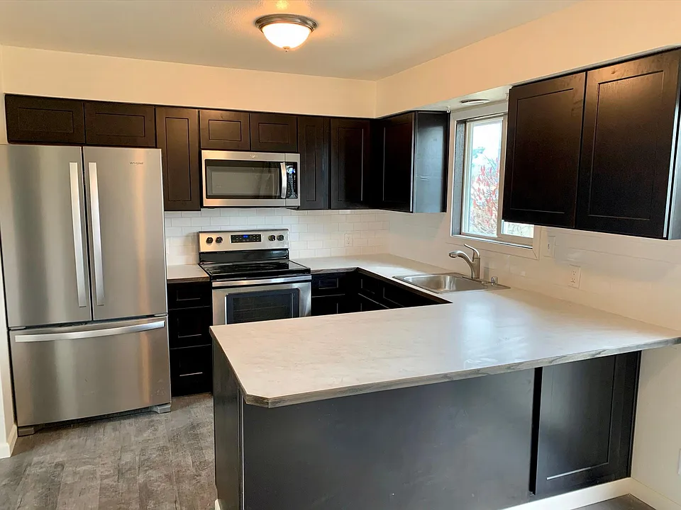 Brand new kitchen complete with brand new stainless steel appliances. Spacious dining room off the kitchen that leads to the large deck.
