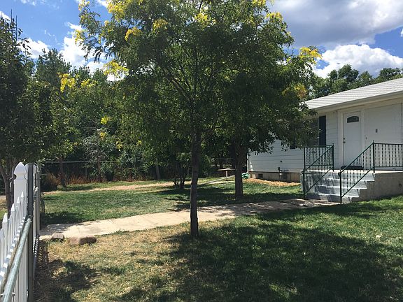 Exterior - front with fruit trees