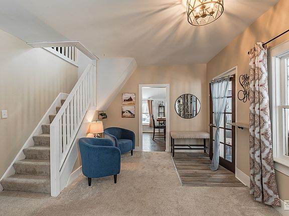 Adorable seating area, greeting you as you enter your living space.