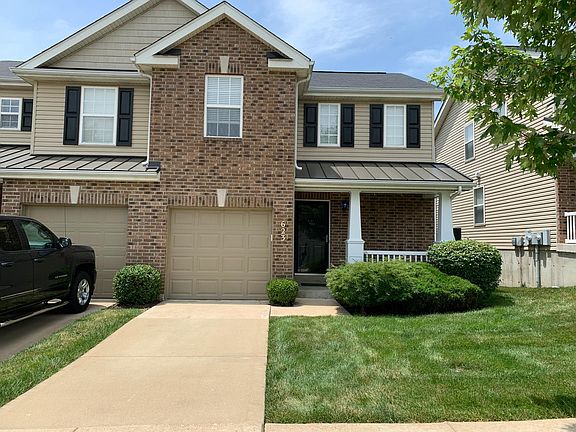 Front exterior view of 2 story condo/townhouse. Landscaping/yard is maintenance free. Snow removal included.