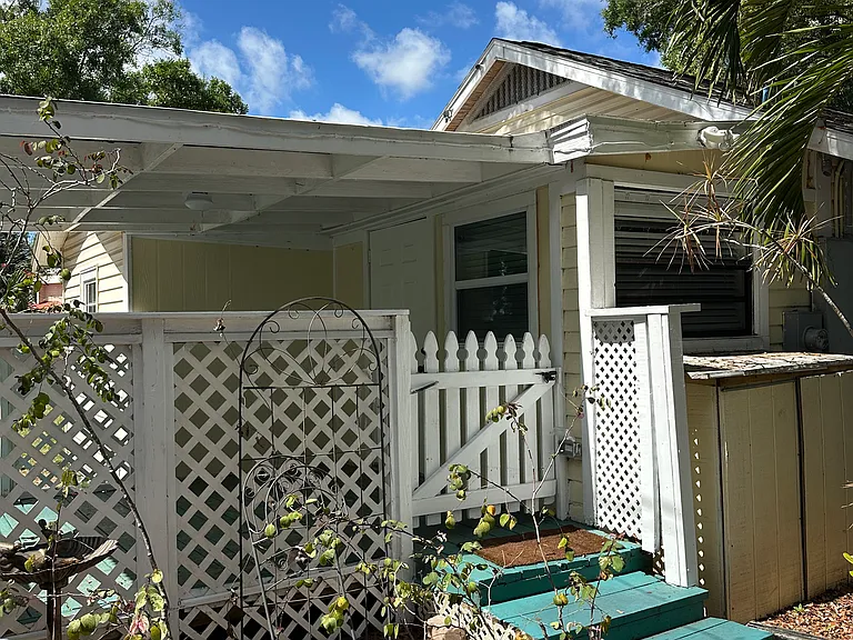 Large gated back porch.