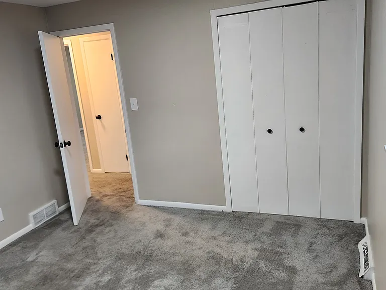 Master BR 03 New paint throughout, modern accessible beige by Sherwin Williams! New LED Light and door hardware, NEW Blinds.