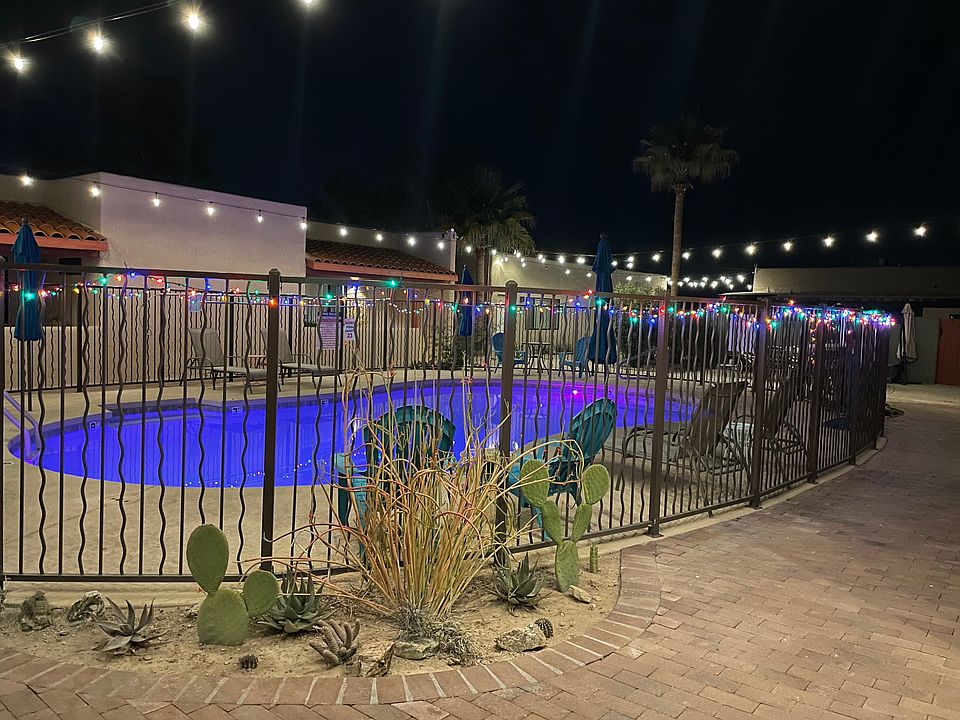 Pool at night, area has plenty of lighting for night time security.