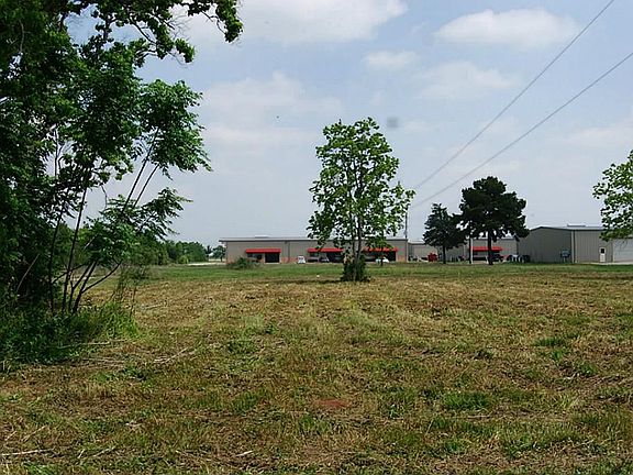 Another view looking north along the western property line to the office warehouse that are located behind the subject property