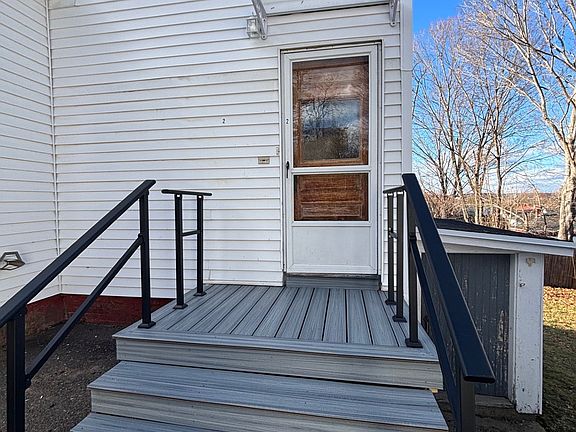 Door to Apartment, blue door to laundry in basement