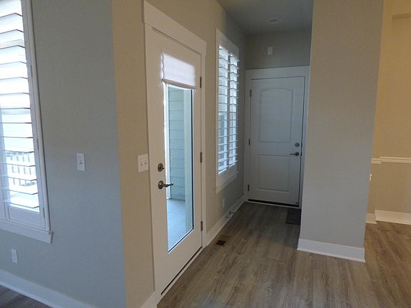 Back entry from garage and out to back porch and patio