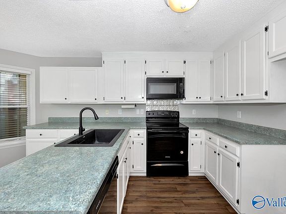 3rd image of 6849 Steeplechase Dr NW