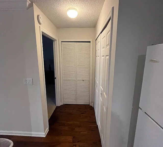 View from kitchen towards master bedroom