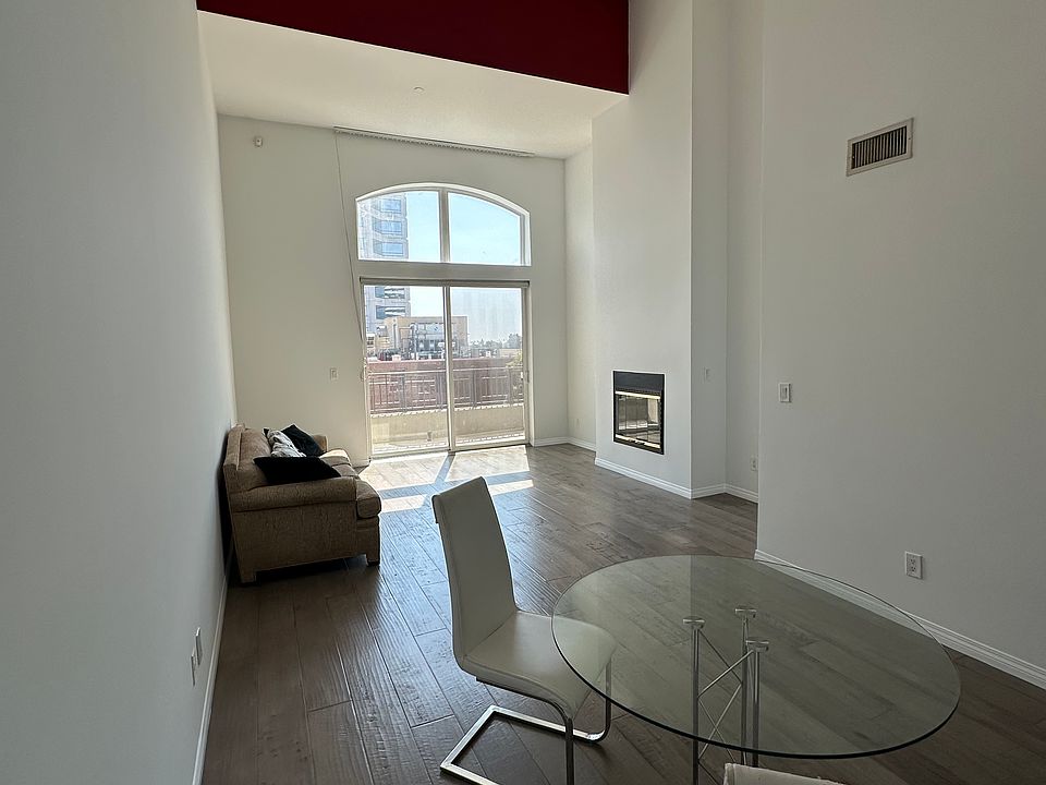 Living room w high ceiling