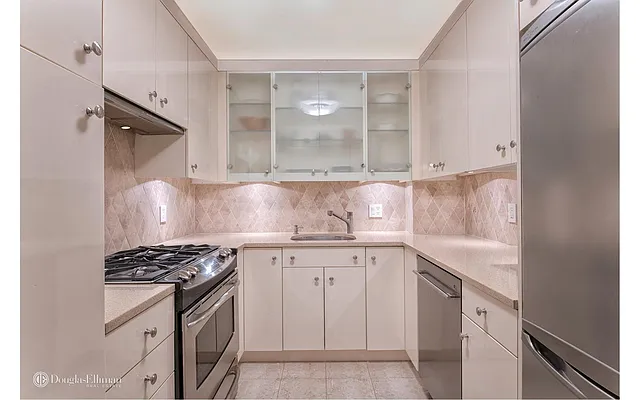 Sold by Douglas Elliman | media 11