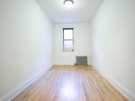 2nd image of 157 E 2nd St APT 1A