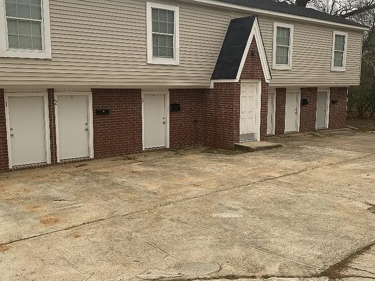 Storage units at bottom below the 1 bedroom apts. Each unit in front building has one also