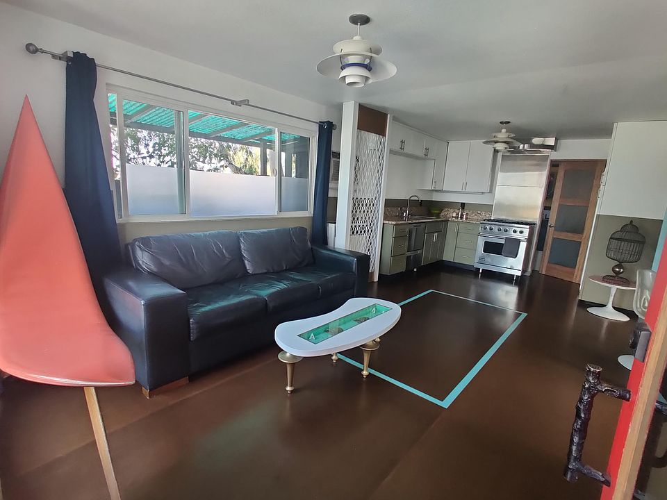 Entry way; living room and kitchen