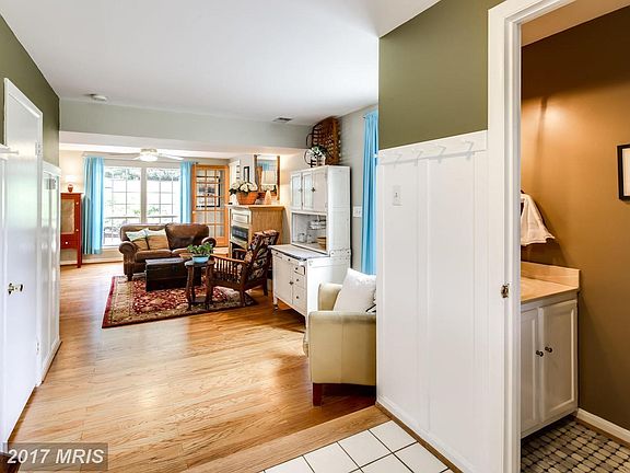 Front entrance with powder room on right.