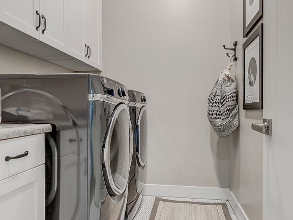 Laundry room with cabinet space