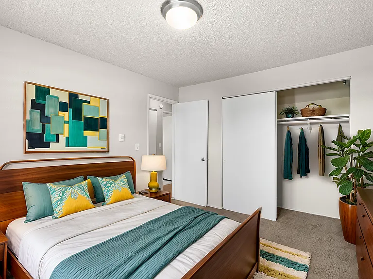 Experience chic comfort in this beautifully designed bedroom.