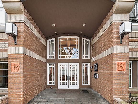 Ballard Place - Entry to Lobby, Concierge, Living Room, Mail Room, Elevator and Secure Garage>