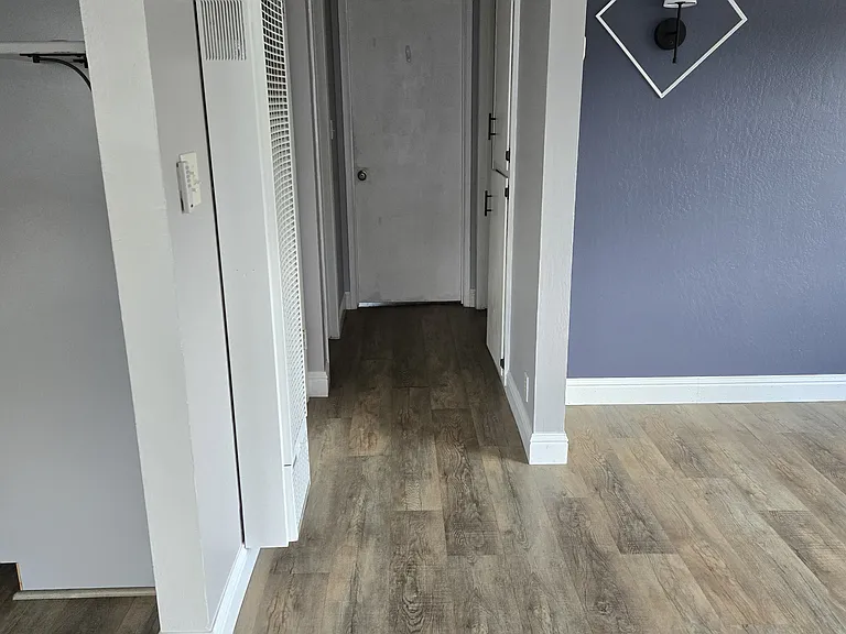 Hallway to bathroom and rooms
