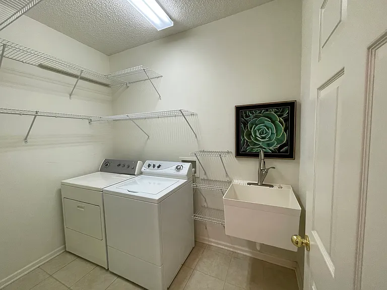 Laundry room with sink
