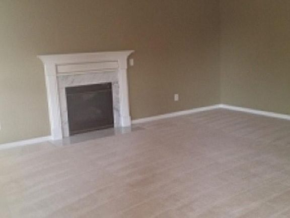 Living room with a fireplace.