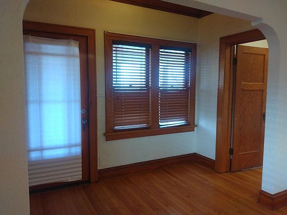 Front foyer from enclosed front porch. Office/third bedroom door to the right
