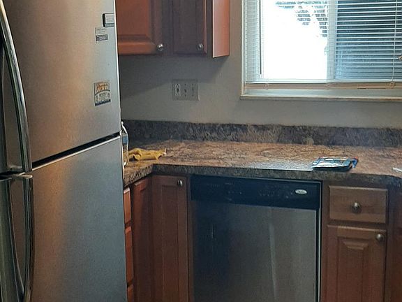 Newly remodeled kitchen with real wood cabinets