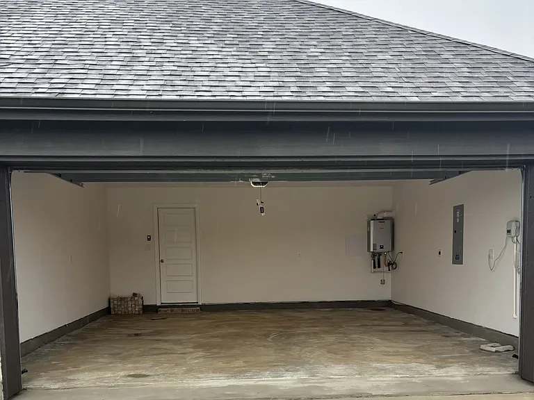 Large 2-car garage, tankless water heater. Additional wireless remote garage door opener available