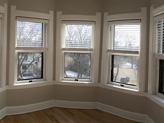 Sun room. Lots of windows and light. And a commanding view of the neighborhood.