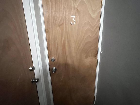 Door to 3rd floor apartment
