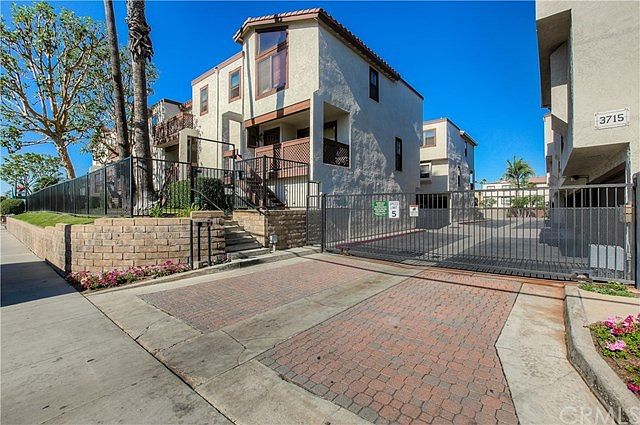 You'll be pleasantly surprised as you drive into this lovely, gated, townhome complex in the city of Torrance!