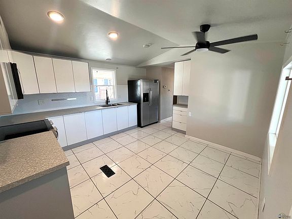 5th image of 13138 E 48th St