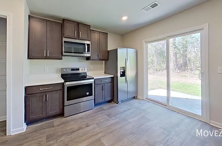 9319 Vineyard Grove Ln NE — Photo 37