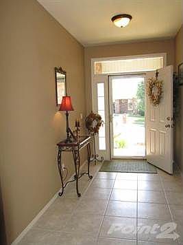 Large Entry Foyer with tile floor.