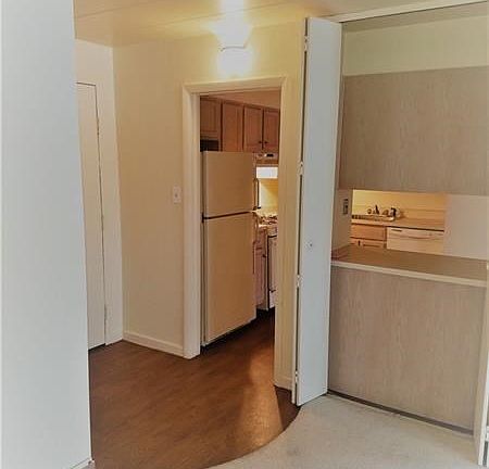 Entry into the condo right near the kitchen area.