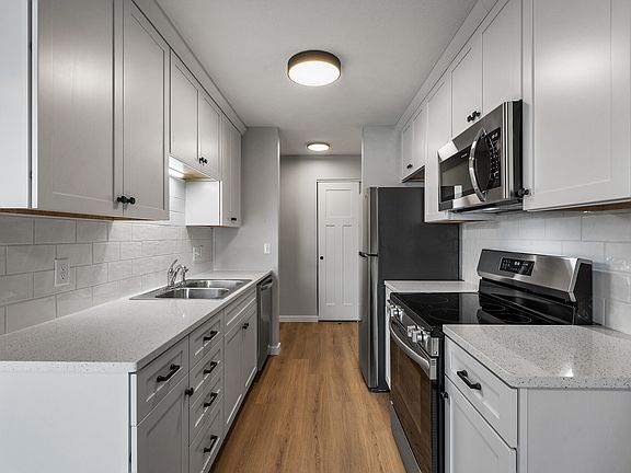 Newly remodeled kitchen with new stainless steel appliances.