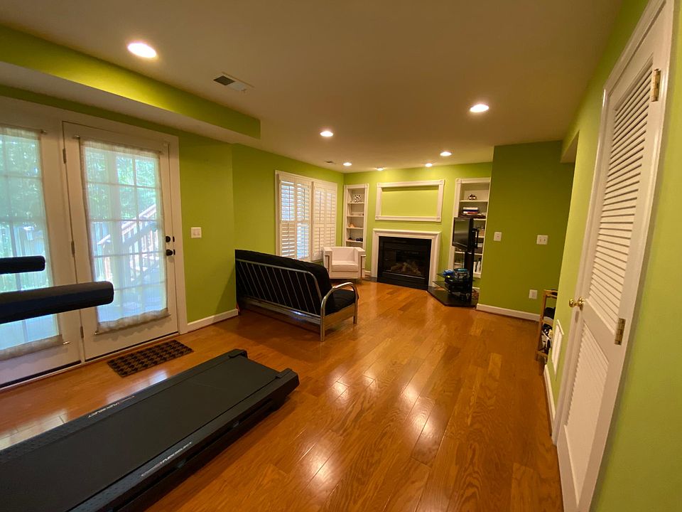 Walkout room with fireplace and patio as well as Garage access, also laundry and full bathroom