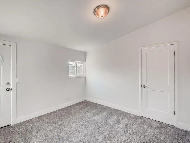 3rd Bedroom on main level. Access to yard and laundry