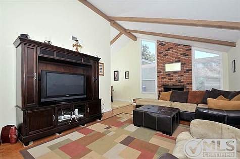 Entrance Greets you with this Beautiful, Spacious, Light and Bright Formal Living Room!