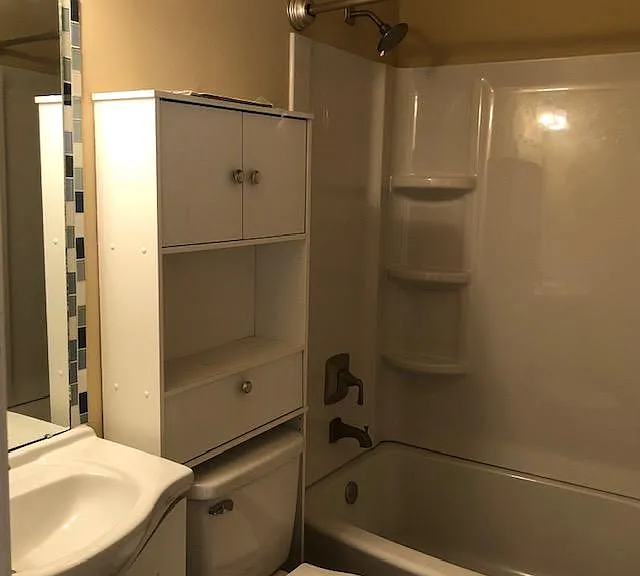 Full bathroom, new bathtub, new vanity and cabinets