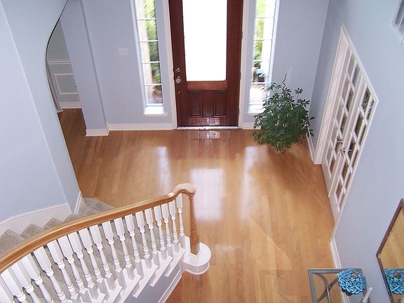 Grand Entry with Wood Floors in Foyer.