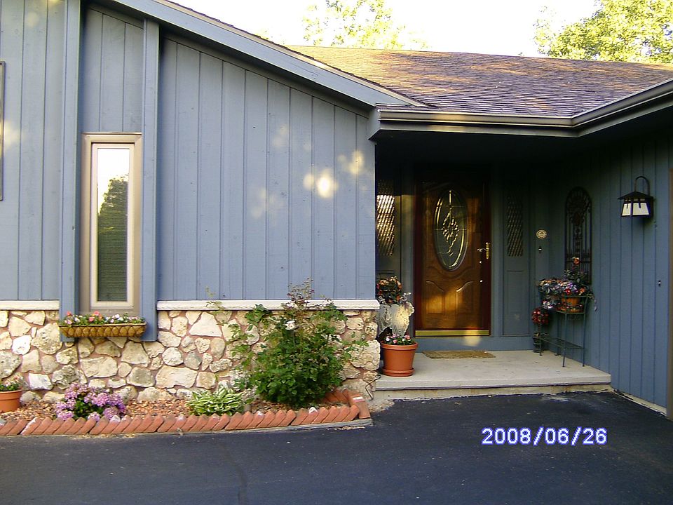 Front of house with leaded glass door