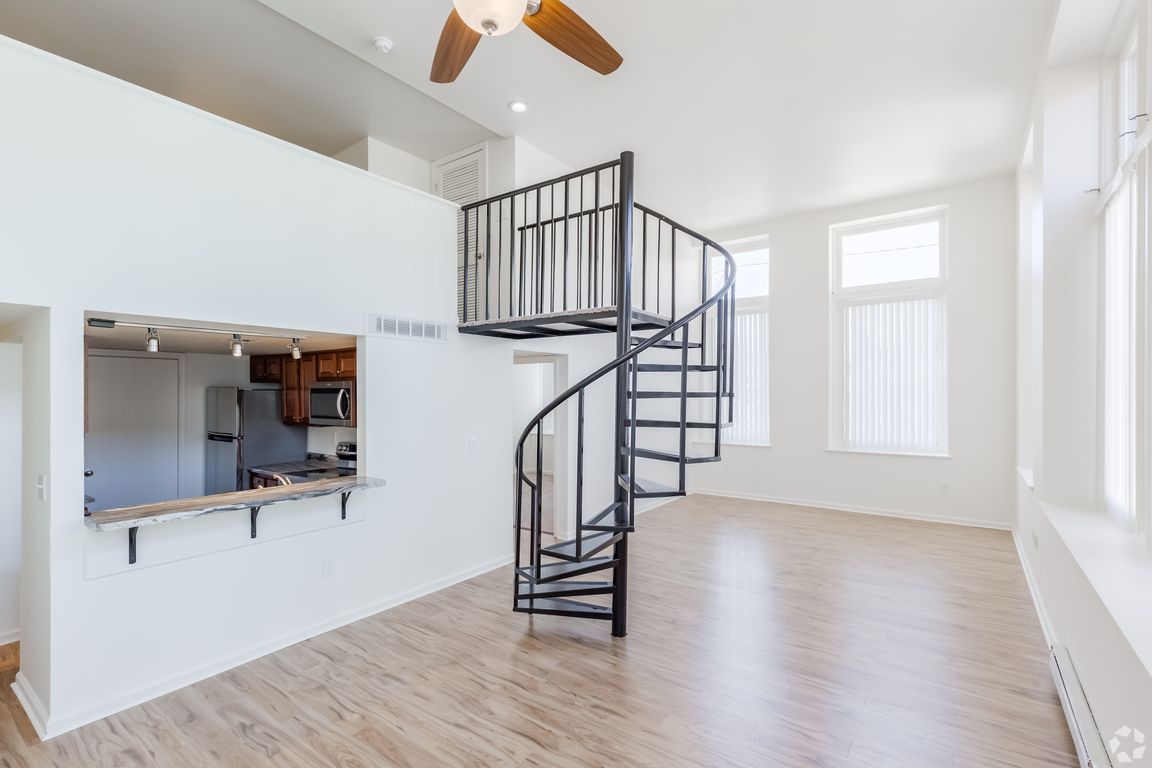 Apt. #208 spiral steps in living room