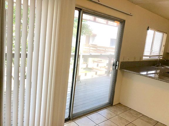 Entry to shaded Balcony overlooking pool